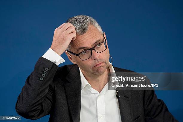 Michel Combes speaks during a press conference of Telecom Company Altice group SFR and NextradioTV media group to announce that SFR will acquire...