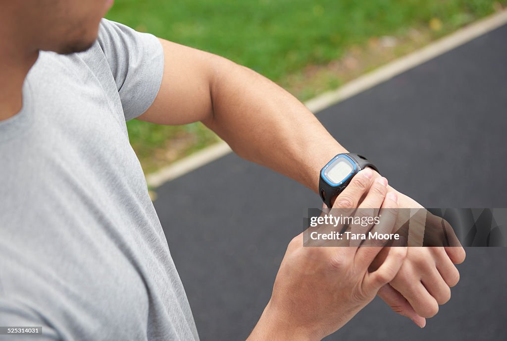 Man with sports digital watch