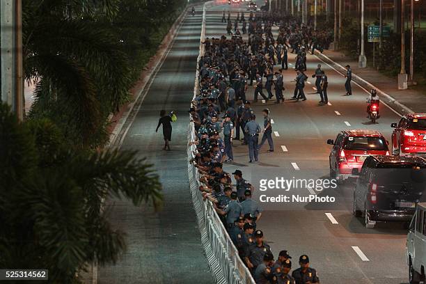 Manila, Philippines - Police officers lineup along Roxas Boulevard for a dry run on Pope Francis' arrival in Manila on Monday, January 12, 2015. The...
