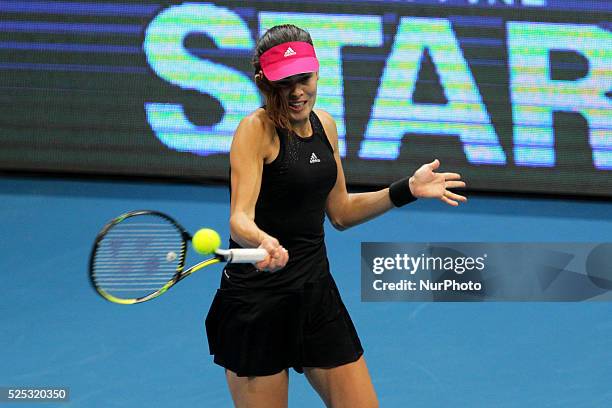 Ana Ivanovic of the Indian Aces makes a forehand return to Kristina Mladenovic of the UAE Royals during their singles match at the International...