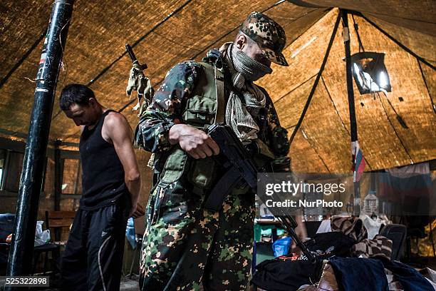 Heavily armed militiamen from the Vostok Battallion took over the Regional administration building in central Donetsk and cleared out the pro-Russian...