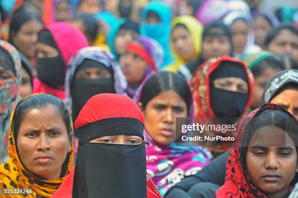 Workers of AMCS Textile at Adamzee EPZ take part in a demonstration in front of National Press Club on February 27, 2015 in Dhaka, following the...