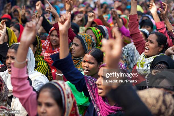 Workers of AMCS Textile at Adamzee EPZ take part in a demonstration in front of National Press Club on February 27, 2015 in Dhaka, following the...