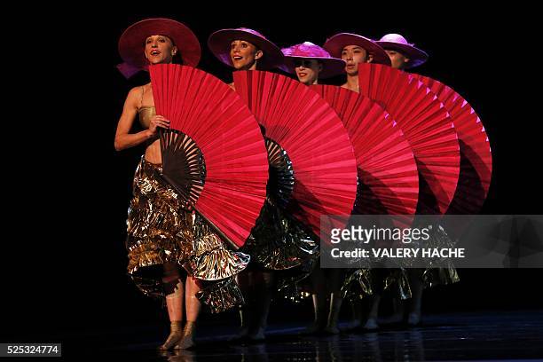 Monte-Carlo ballet dancers perform in the show "Chapeau", a creation of Jiri Kylian, at the Grimaldi Forum on April 27, 2016 in Monaco. / AFP /...