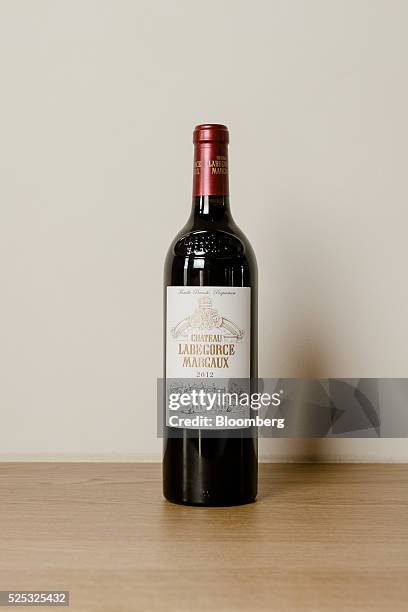 Bottle of 2012 Chateaux Labegorce wine sits on display at Chateau Marquis d'Alesme in Margaux, France, on Thursday, April 14, 2016. Bordeaux has been...