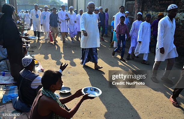 Indian Muslim devotee beggar ask for alms money on the street on the occasion of Eid al-Adha in Dimapur, India north eastern state of Nagaland on...