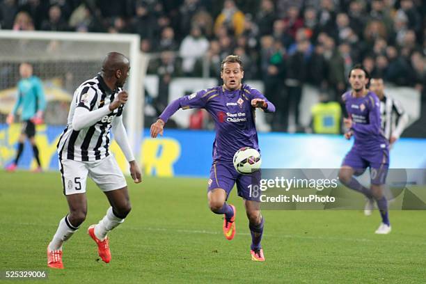 Angelo Ogbonna and Alessandro Diamanti in action during Coppa Italia-Tim Cup semifinal between Juventus FC and ACF Fiorentina at Juventus Stafium on...