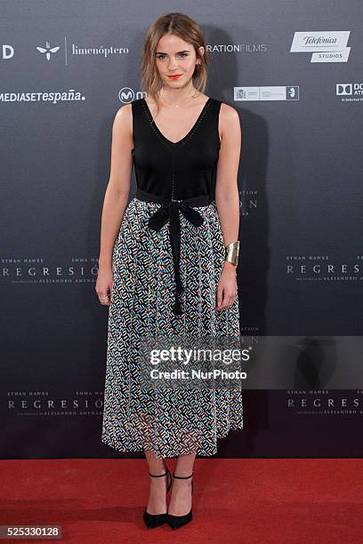 English actress Emma Watson poses during the photocall of Hispano-Chilean director Alejandro Amenabar's movie 'Regression' in Madrid on August 27,...