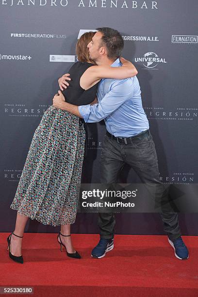 Actress Emma Watson and director Alejandro Amenabar attend a photocall for 'Regression' at the Villamagna Hotel on August 27, 2015 in Madrid, Spain.