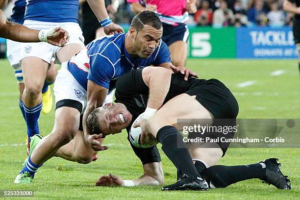 Colin Slade of NZL All Blacks slips and allows David Philander of Namibia to pounce during the IRB RWC 2015 match between New Zealand All Blacks v...