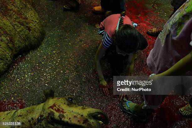 Children during Eid al-Adha sacrifice feast day in Cairo, Egypt on September 25, 2015 To celebrate Muslims slaughter sheep, goats, cows and camels to...