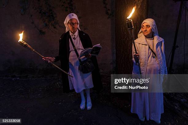 Thousands of Gypsies attend celebrations of the Via Crucis outside the Colosseum in Rome on October 24, 2015. Thousands of Gypsies have come from all...
