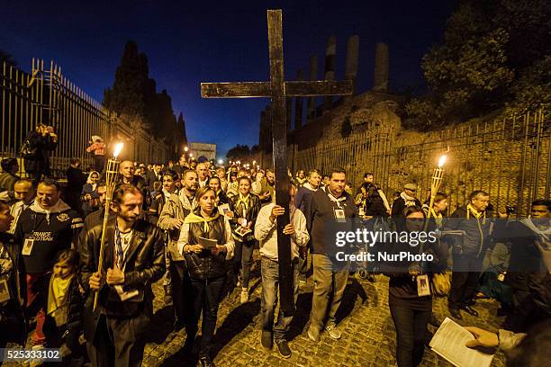 Thousands of Gypsies attend celebrations of the Via Crucis outside the Colosseum in Rome on October 24, 2015. Thousands of Gypsies have come from all...