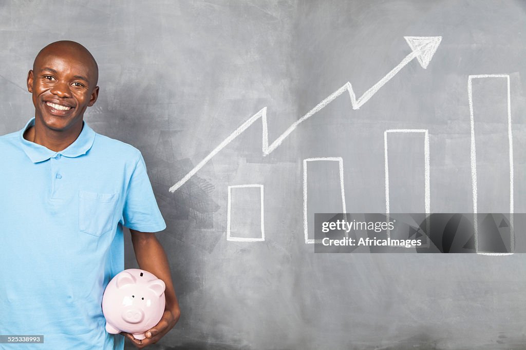 African male happy with the growth of his savings