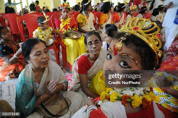 Hindu girls dressed up as Kumari wait for rituals to start during Ramnavmi festival at the Adyapeath Ashram on the outskirts of Kolkata March 28,...
