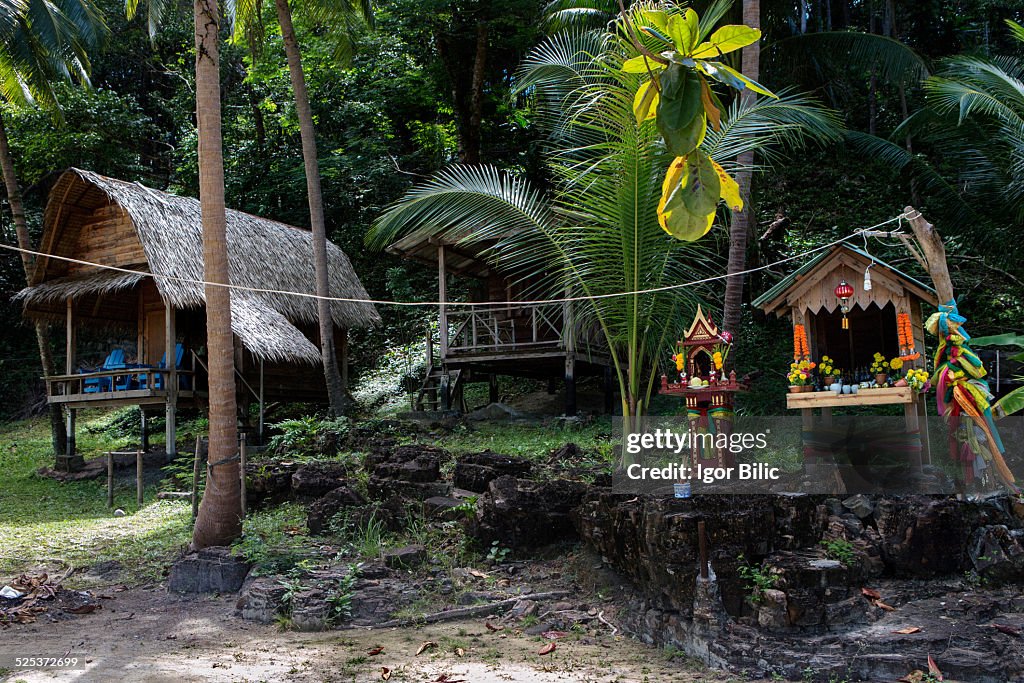 Spirit houses and wooden huts on Koh Wai island