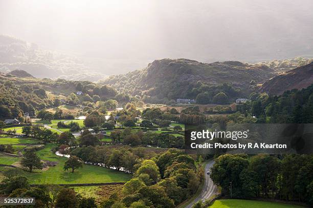 sunbeams over syngun, snowdonia - the motor village stock pictures, royalty-free photos & images