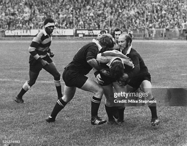 The New Zealand national rugby union team, the All Blacks during a match against Wales in Cardiff, 4th November 1972. Here Mike Knill of Wales is...