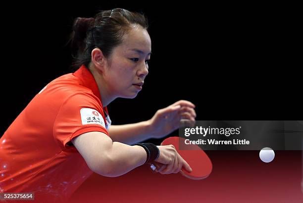 Tie Yana of Hong Kong in action against Liu Shiwen of China during day one of the Nakheel Table Tennis Asian Cup 2016 at Dubai World Trade Centre on...