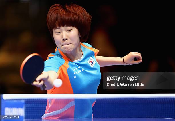 Lee Zion of Korea in action against Miu Hirano of Japan during day one of the Nakheel Table Tennis Asian Cup 2016 at Dubai World Trade Centre on...