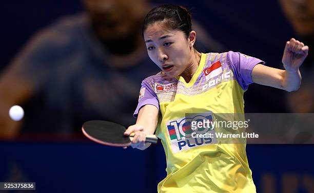 Yu Mengyu of Singapore in action against Li Xiaoxia of China during day one of the Nakheel Table Tennis Asian Cup 2016 at Dubai World Trade Centre on...