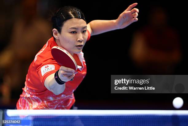 Jiang Huajun of Hong Kong in action against Mima Ito of Japan during day one of the Nakheel Table Tennis Asian Cup 2016 at Dubai World Trade Centre...