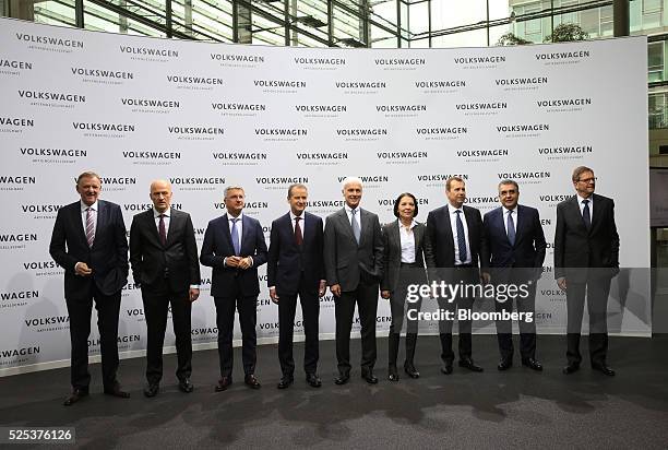 Left to right, Andreas Renschler, chairman of MAN SE, Frank Witter, chief financial officer of Volkswagen AG, Rupert Stadler, chief executive officer...