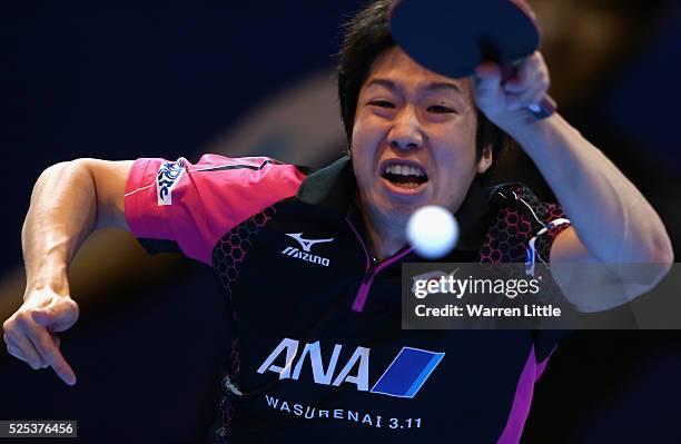 Jun Mizutani of Japan in action against Ho Kwan Kit of Hong Kong during day one of the Nakheel Table Tennis Asian Cup 2016 at Dubai World Trade...