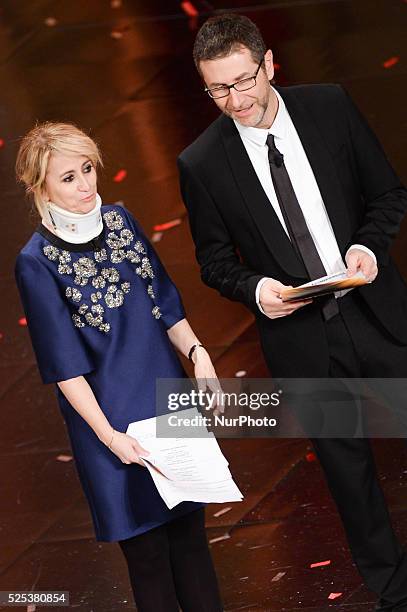 Luciana Littizzetto and Fabio Fazio attend the opening night of the 64rd Sanremo Song Festival at the Ariston Theatre on February 18, 2014 in...