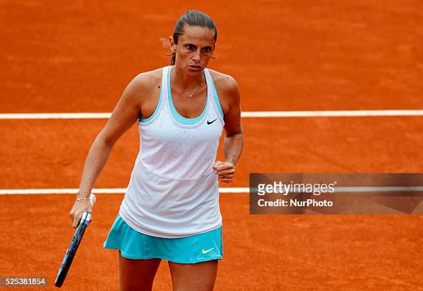 Italian tennis player Roberta Vinci celebrates after winning point during the match against Puerto Rican tennis player M��nica Puig at the Madrid WTA...