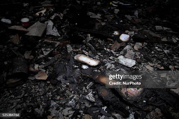 School book that burned at the burn houses site. After big fire hit the slum area in Gandaria-South Jakarta, victim of the houses have not visitted...