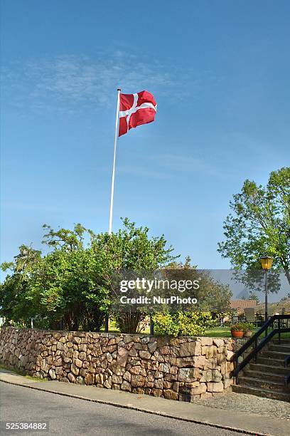 Denmark, Bornholm Island Pictures taken between 1st and 5th August 2014. Pictured: Street in the Allinge city with Danish flag on the wind