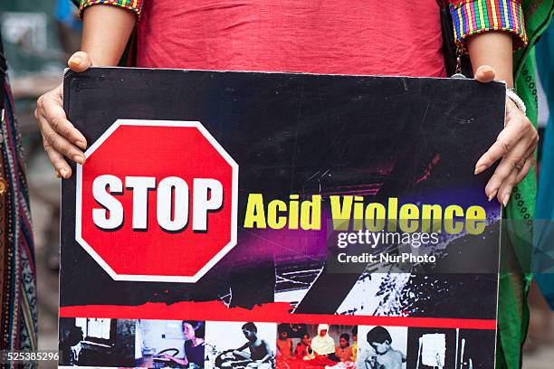 May 12 : Survivors of acid attacks, attend a human chain to protest acid attacks and torture of women in Dhaka on 12th May 2015. According to Acid...