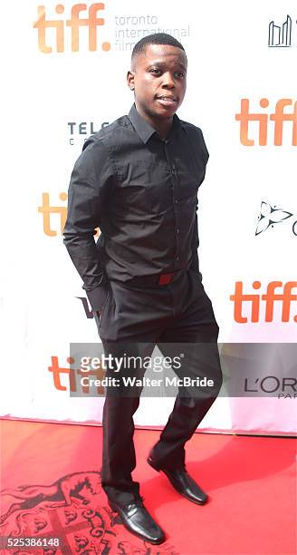 Mpho Koaho arrives at the 'Black and White' premiere during the 2014 Toronto International Film Festival at Roy Thomson Hall on September 6, 2014 in...