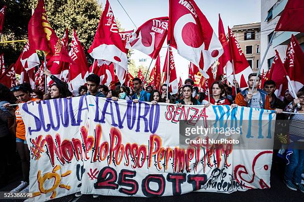 Students take part in a demonstration organised by the Italian trade union CGIL to protest in Rome against the Italian government's plans to overhaul...