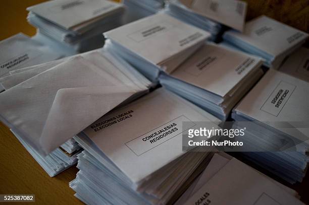 Envelopes for introducing the ballots are seen in a pool station in Barcelona on May 24, 2015. Polls opened at 9:00 am , with voters turning out to...