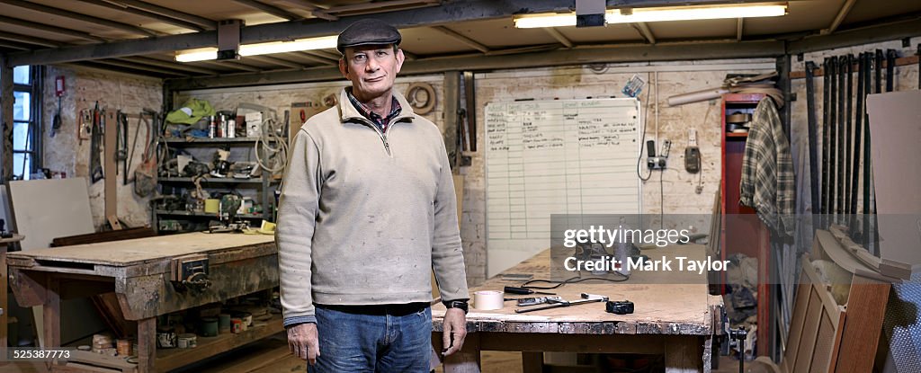 Portrait of a cabinet maker in his working environment