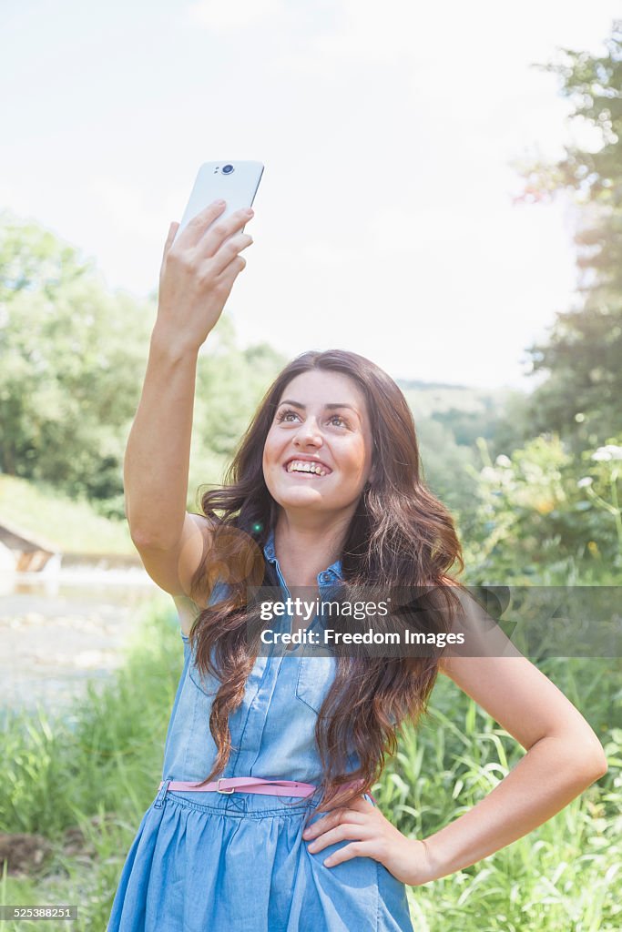 Young woman taking selfie