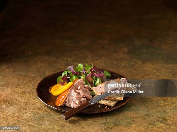 christmas snack of duck liver pate with truffles. mixed salad leaves and orange slices - foie gras photos et images de collection