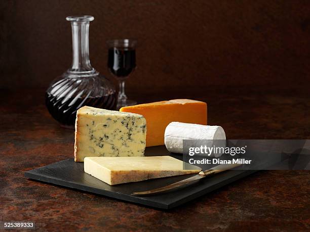 cheese board with red wine - cheese board imagens e fotografias de stock