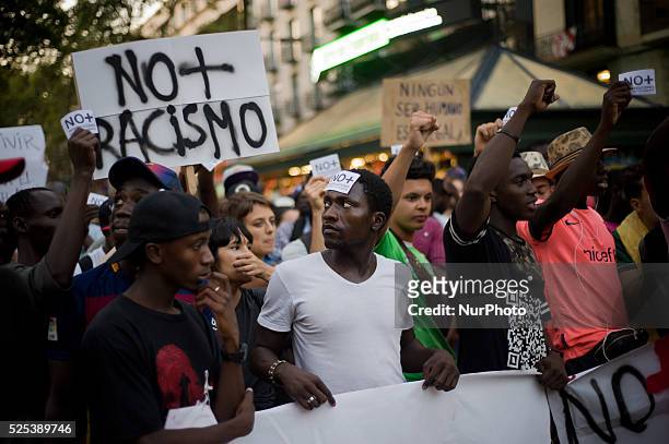 Demonstrators march against racism and police in Barcelona on 11 August 2015. Several hundred people demonstrated in Barcelona against racism because...