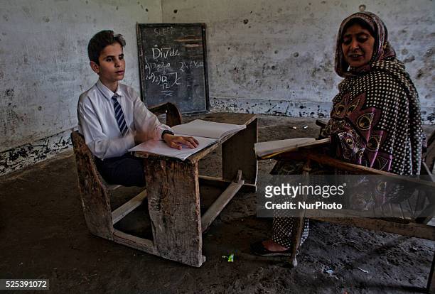 Naseema Bano, a teacher, who herself is a blind, teaches Braille to the blind students at Abhedananda Home, a school for deaf, dumb and blind...