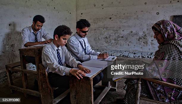 Naseema Bano, a teacher, who herself is a blind, teaches Braille to the blind students at Abhedananda Home, a school for deaf, dumb and blind...