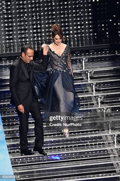 Carlo Conti and Elena Sofia Ricci attend the fourth night of 65th Festival di Sanremo on February 13, 2015 in Sanremo, Italy.