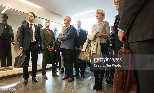 At the Council of State lawyers and stakeholders are seen waiting for the case against the state on gas extraction in the province of Groningen to...