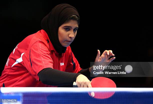 Noura Almaazmi of the United Arab Emirates in action against Yu Mengyu of Singapore during day one of the Nakheel Table Tennis Asian Cup 2016 at...