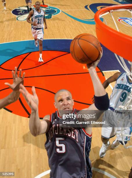 Point guard Jason Kidd of the New Jersey Nets shoots a layup during game four of the Eastern Conference Semifinals against the Charlotte Hornets...