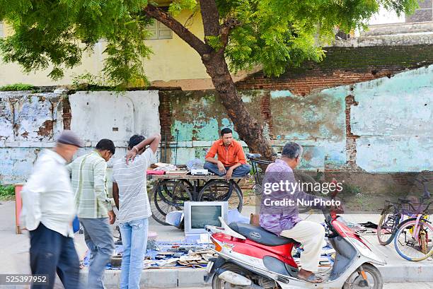 Various stuff for selling at open market, GujariBazaar in Ahmedabad. GujariBazaar is 600 years old market of fun collection of old furniture,...