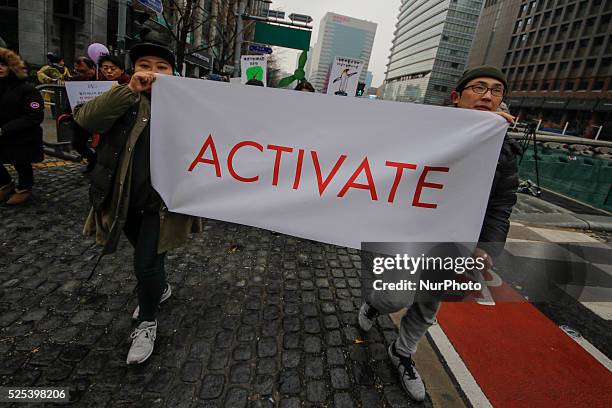 November 29, 2015 - South Korea, Seoul : Environmental activists and EU 20 Country Ambassador attend hold Picket or banners with marching during the...