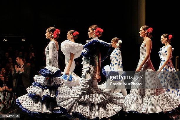 Models during Fashion show on the Andalusian regional costume that each spring renews its collections is the only regional with costume renewal every...